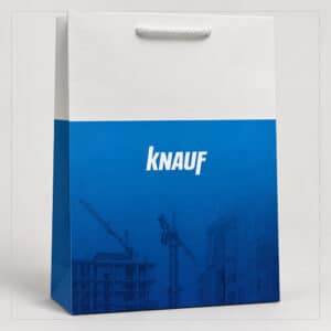 Biało-niebieska torba reklamowa z logo Knauf i białym uchwytem